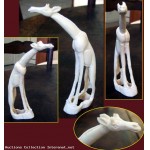 Girafe Sculpture Art Africain en defense de phacochere